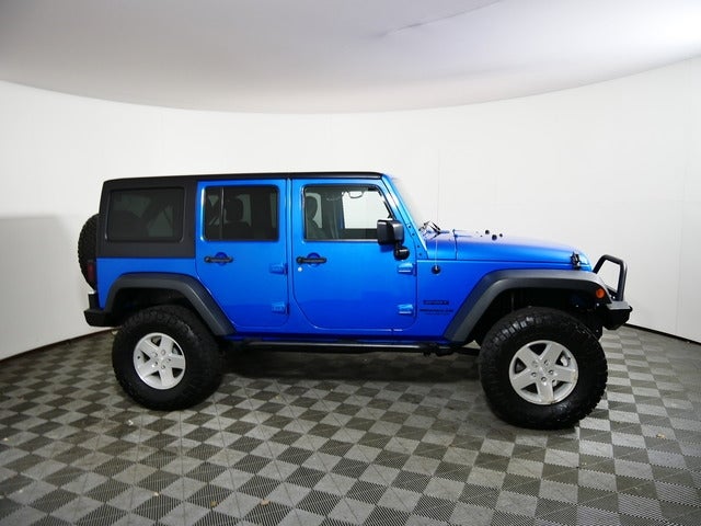 Used 2016 Jeep Wrangler Unlimited Sport with VIN 1C4BJWDG6GL105621 for sale in Minneapolis, Minnesota